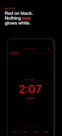 Safelight mode: the running timer in red on a black screen, reading 2:07 in the developer.